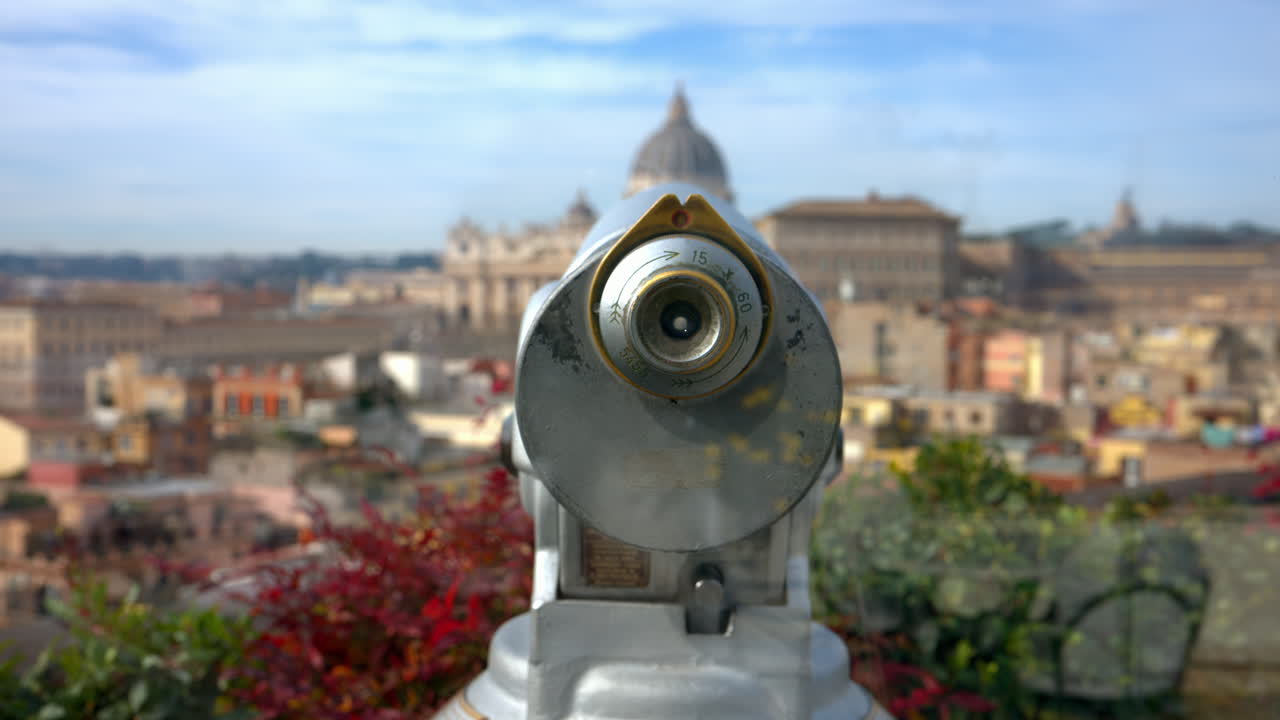 Rome, Italy - February 16, 2024: Viewing binocular with panoramic city view on the background. Vertical