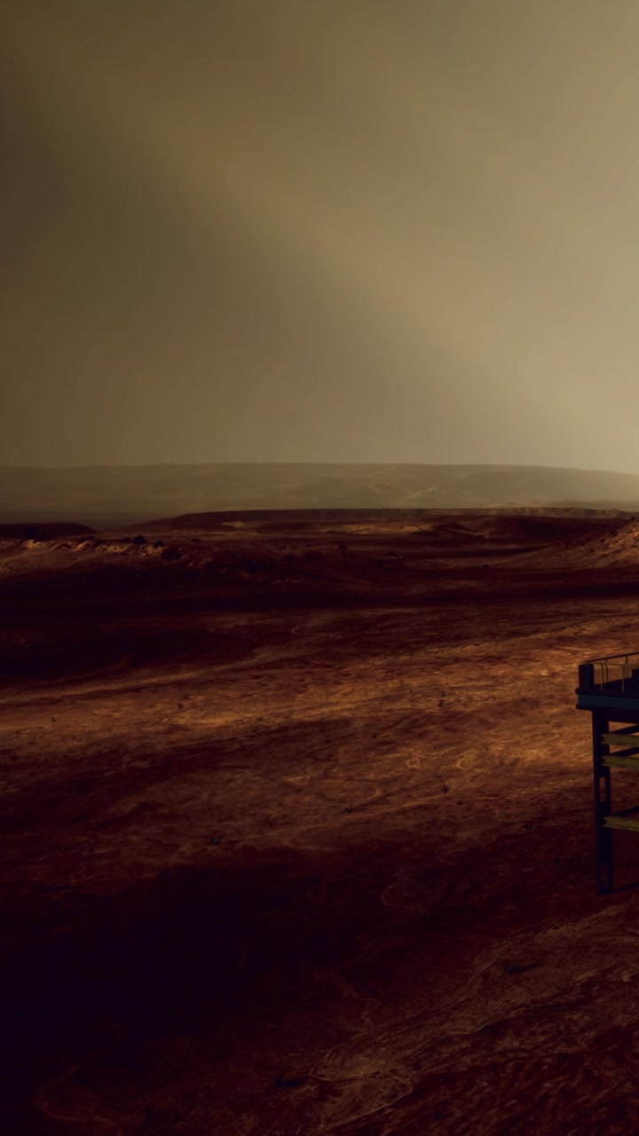 View of a barren landscape on another planet during dusty weather conditions