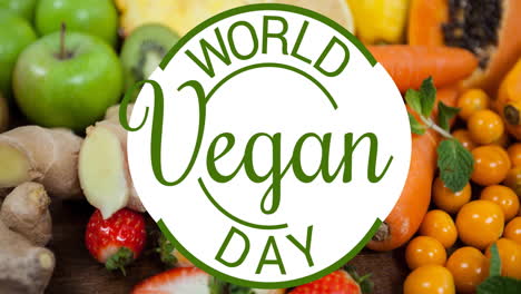 animation of world vegan day text over fruit and vegetables