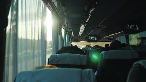 view from inside the passenger bus with tourists