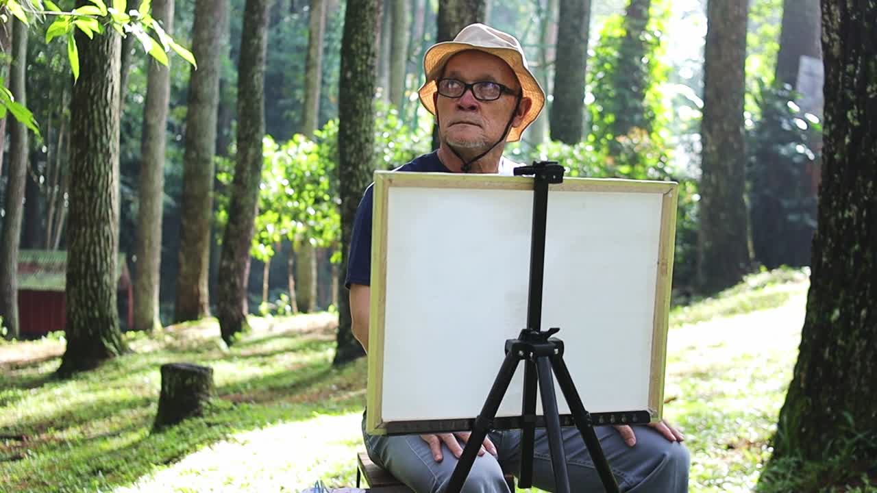 Artist finds inspiration painting nature's beauty in serene forest setting