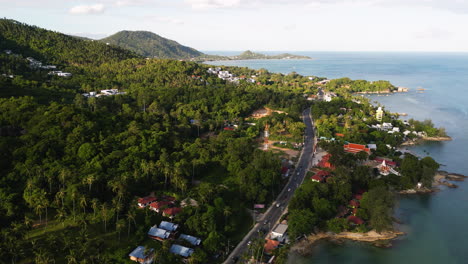 beautiful coastal road and lamai beach in thailand, aerial drone view