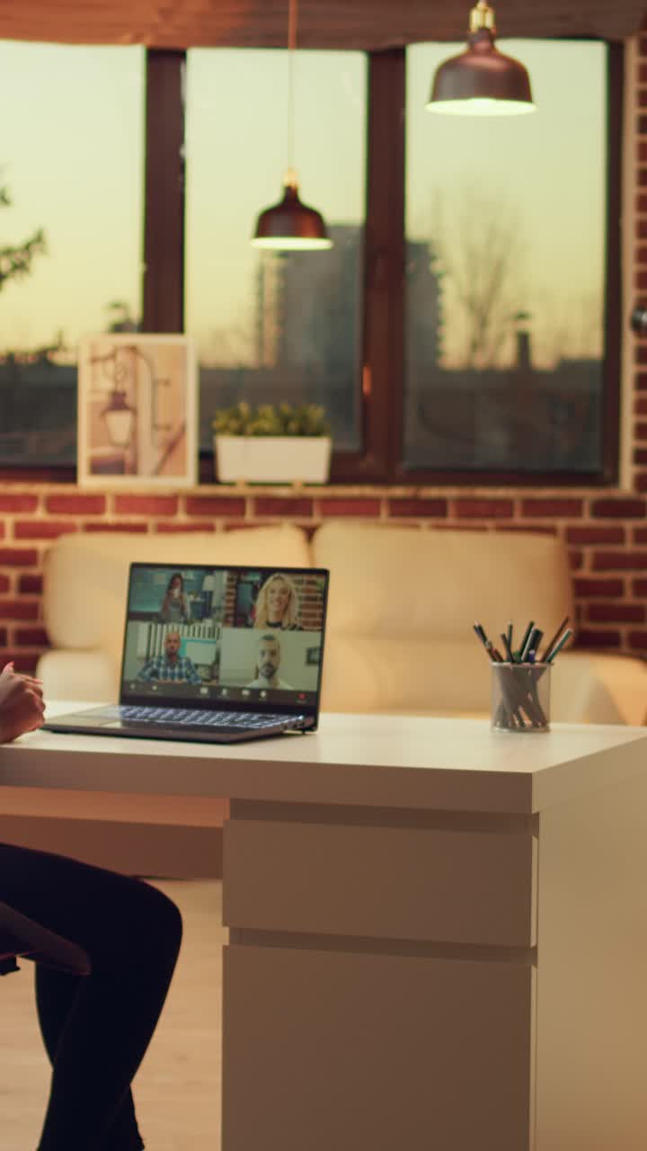 Vertical Worker chatting on videocall conference