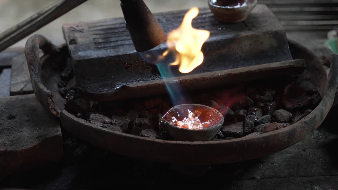 Silver metal melting high temperature fire handcrafted jewelry making art craft