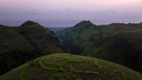 Rounded-shapes,-vibrant-lush-green-grass,-Teletubbies-hills-of-Bali