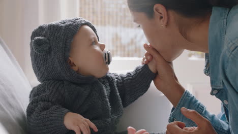 happy mother playing with baby wearing funny costume loving mom having fun with cute toddler at home parent bonding with child enjoying motherhood childcare