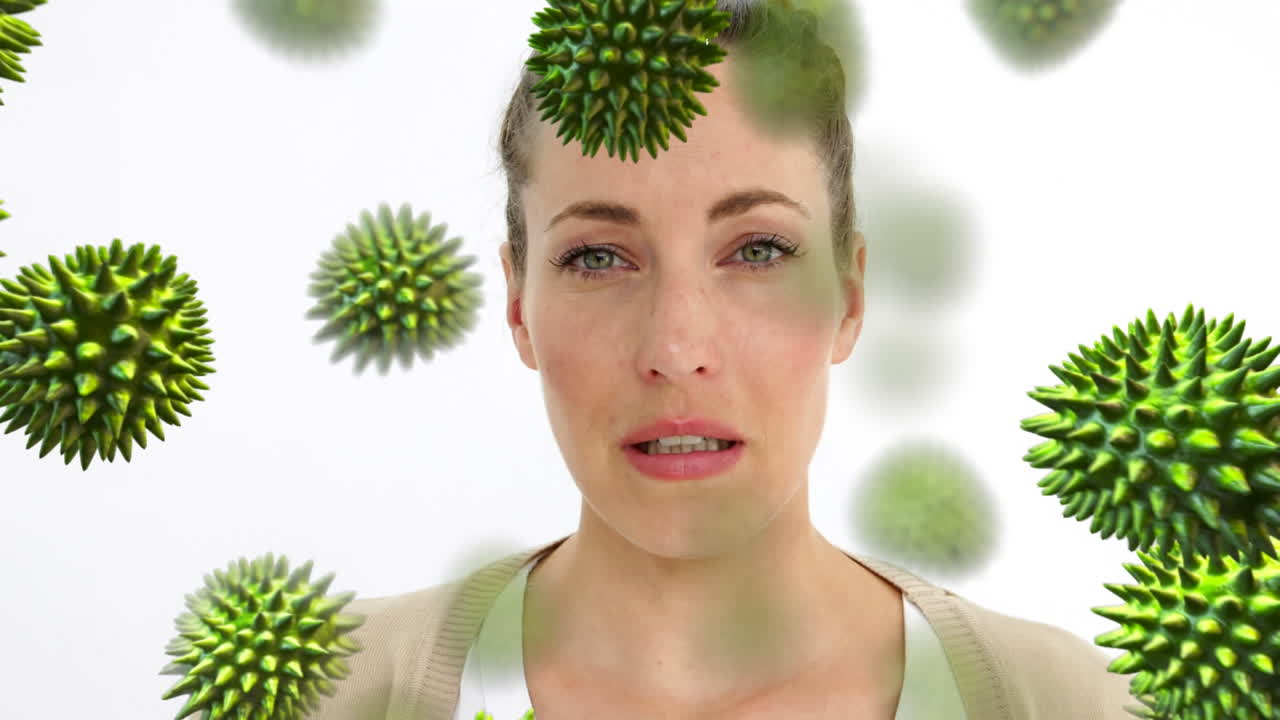 Animation of falling covid 19 cells over sick caucasian woman