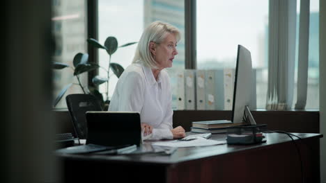 senior woman working in an office