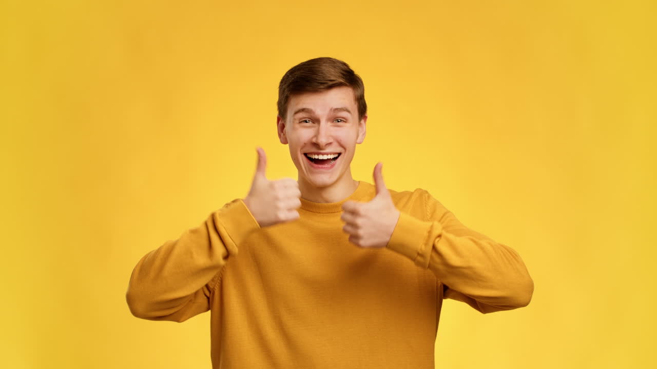 Man Smiling with Thumbs Up