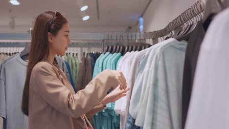 woman shopping for clothes in a retail store