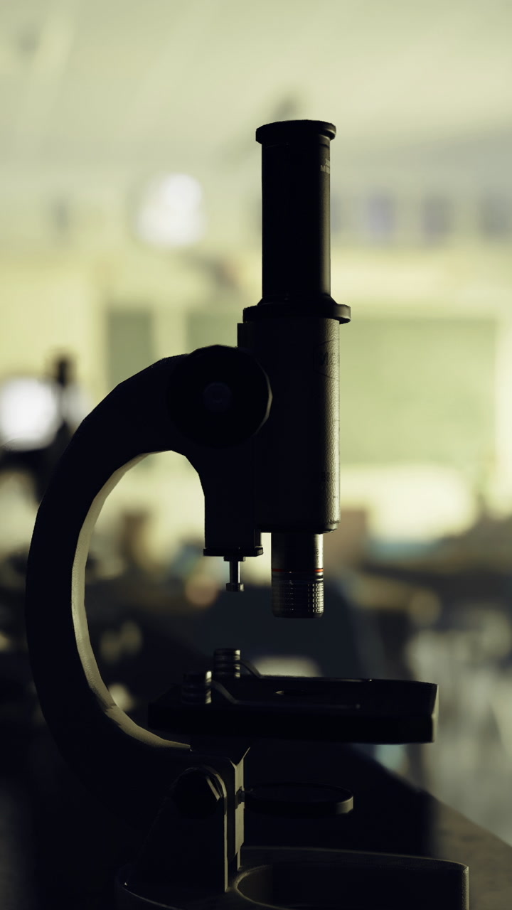 Microscope on a lab table during a science class session in a classroom