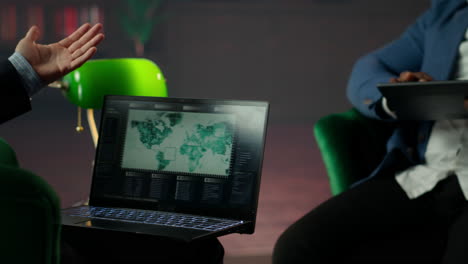 Team of government spies meeting at CIA headquarters to monitor surveillance