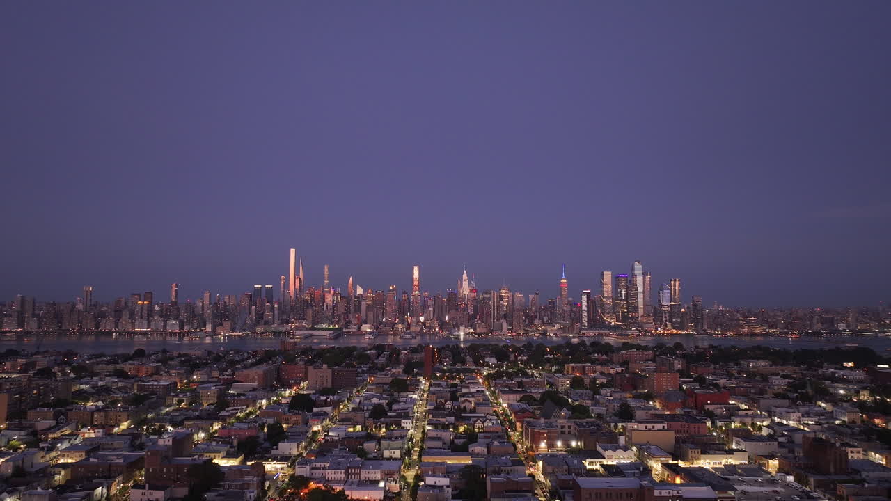 Aerial view of Midtown Manhattan at night. Shot in New Jersey