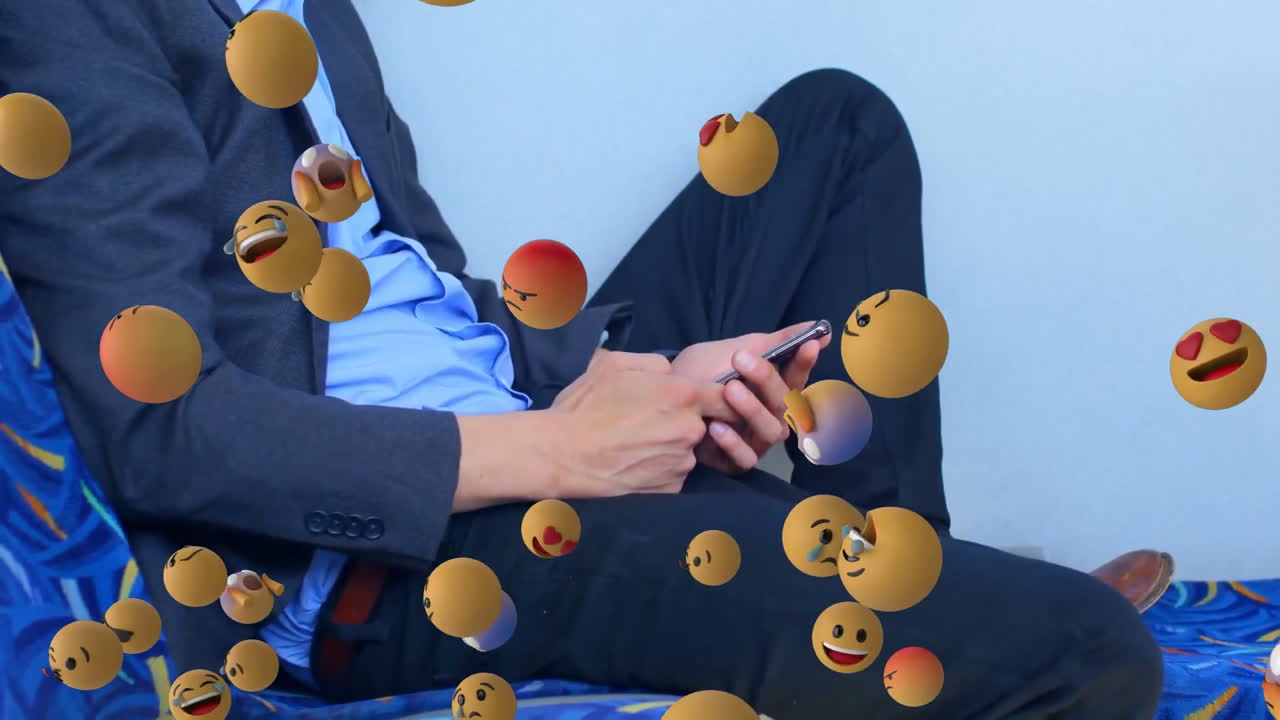 스마트폰을 사용하는 남자가 배경에 있는 이모지 아이콘