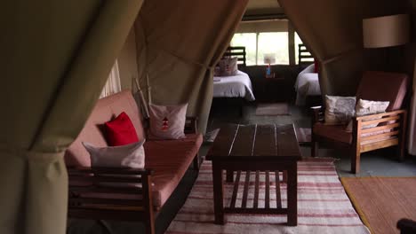 interior of a luxury safari tent on safari on the masai mara reserve in kenya africa