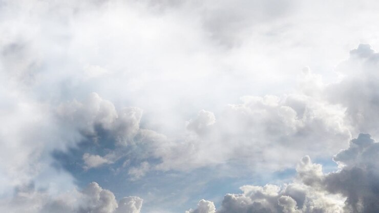 thick white clouds in the blue sky