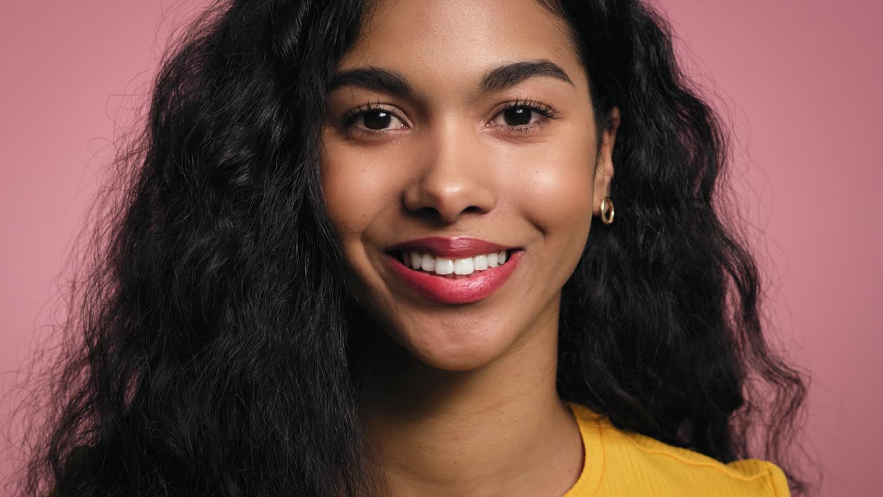 Close up portrait of smiling young African woman
