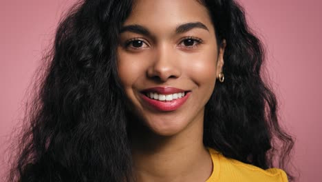 Close-up-portrait-of-smiling-young-African-woman