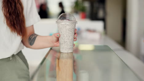 coffee shop, counter and hands of women customer