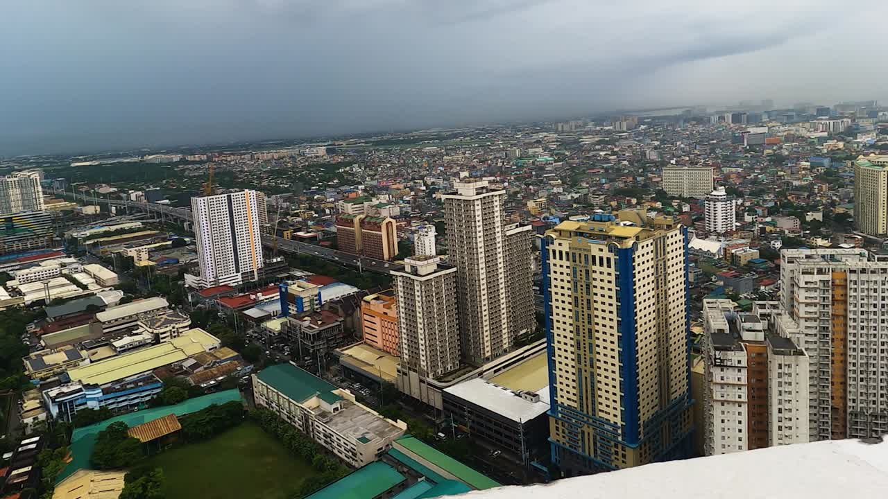 Extensive Metro Skyline And Cityscape In The Philippines. Pan Shot