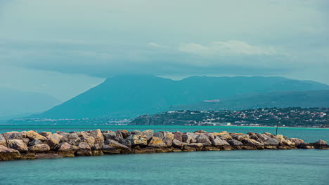 casteldaccia, italy: view of casteldaccia beach with waves crashing on the beach in timelapse