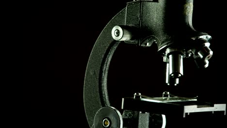 microscopio estudiantil de época en rotación de bucle sin costuras