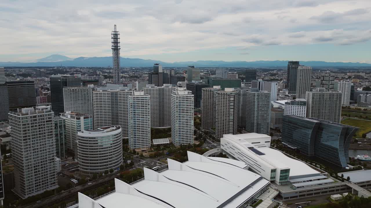 Drone panning right over Yokohama skyline in Greater Tokyo Area Japan