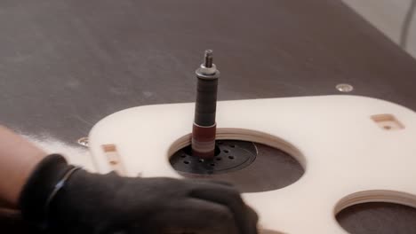 woodworking project with router and sanding tool