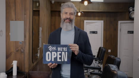 barber shop owner welcoming customers