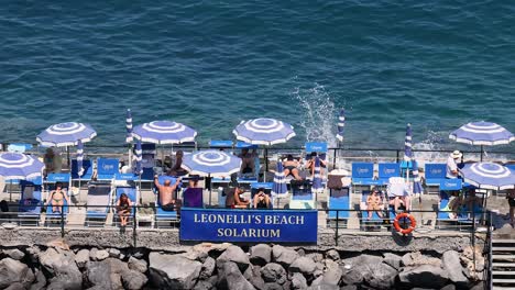 people enjoying the sun and sea