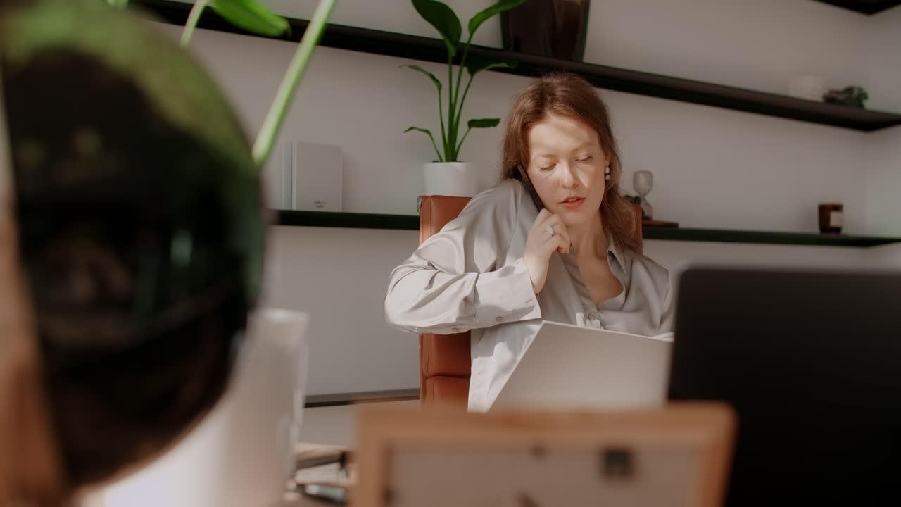 Woman working from home on phone call