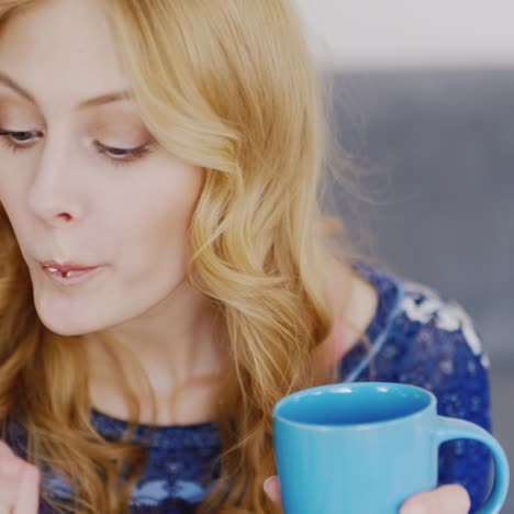 young woman eats sweets close-up