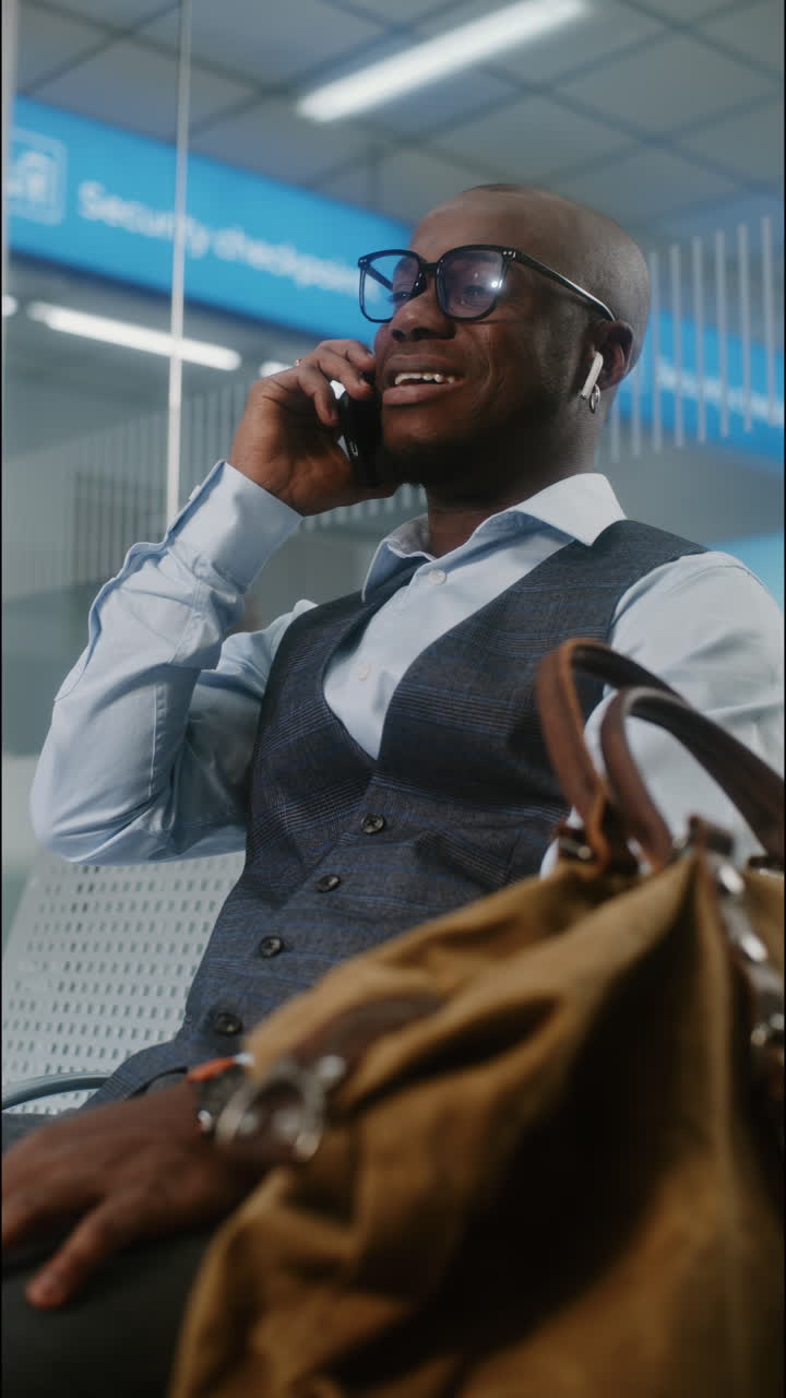 Businessman waiting in an airport terminal