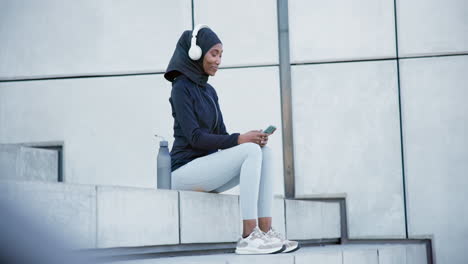 muslim woman, phone and headphones for exercise