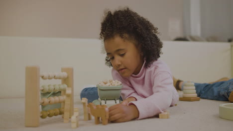 little girl with eco toys