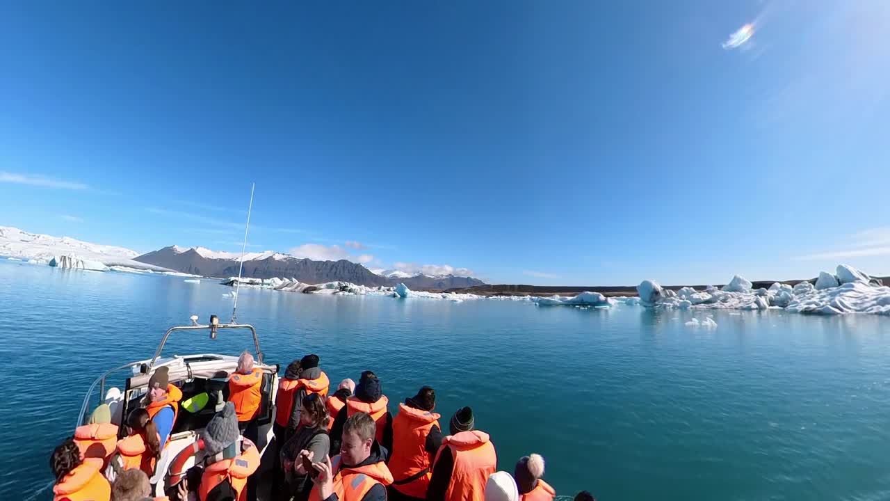 Iceland's stunning winter scenery captivates travelers with its snow-covered mountains and vibrant skies.