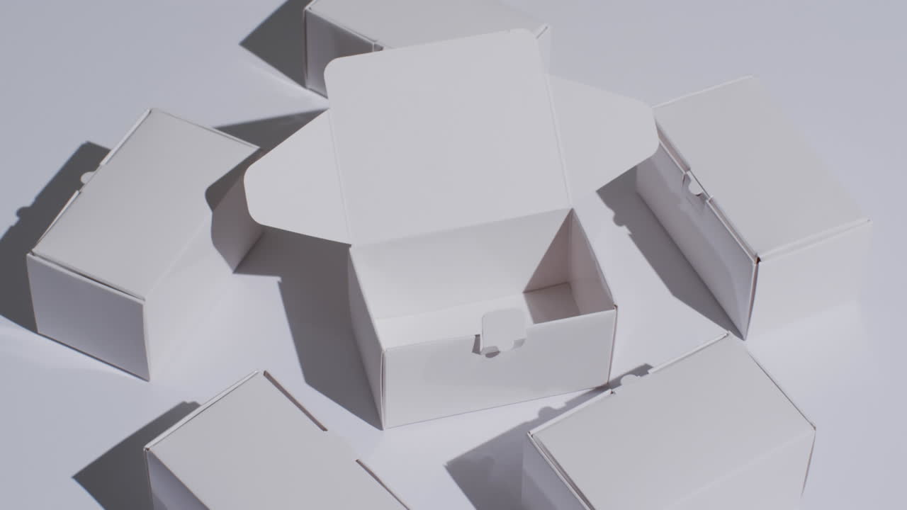 Video of cardboard boxes with copy space over white background