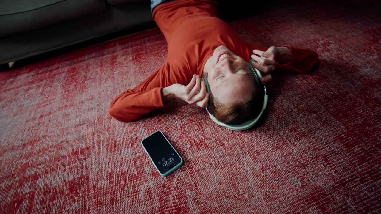 Woman Relaxing on Floor with Headphones