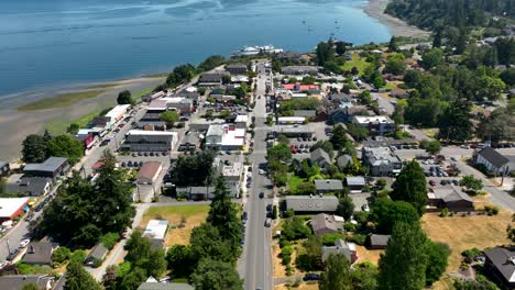 Wide-aerial-shot-looking-down-main-street-in-Langley,-Washington