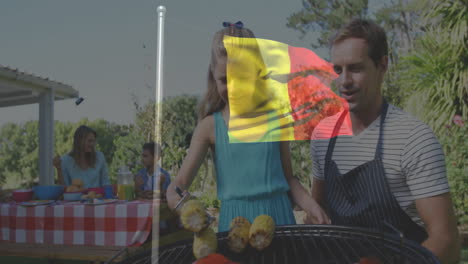 barbecue outdoors with family, belgian flag animation overlay in background