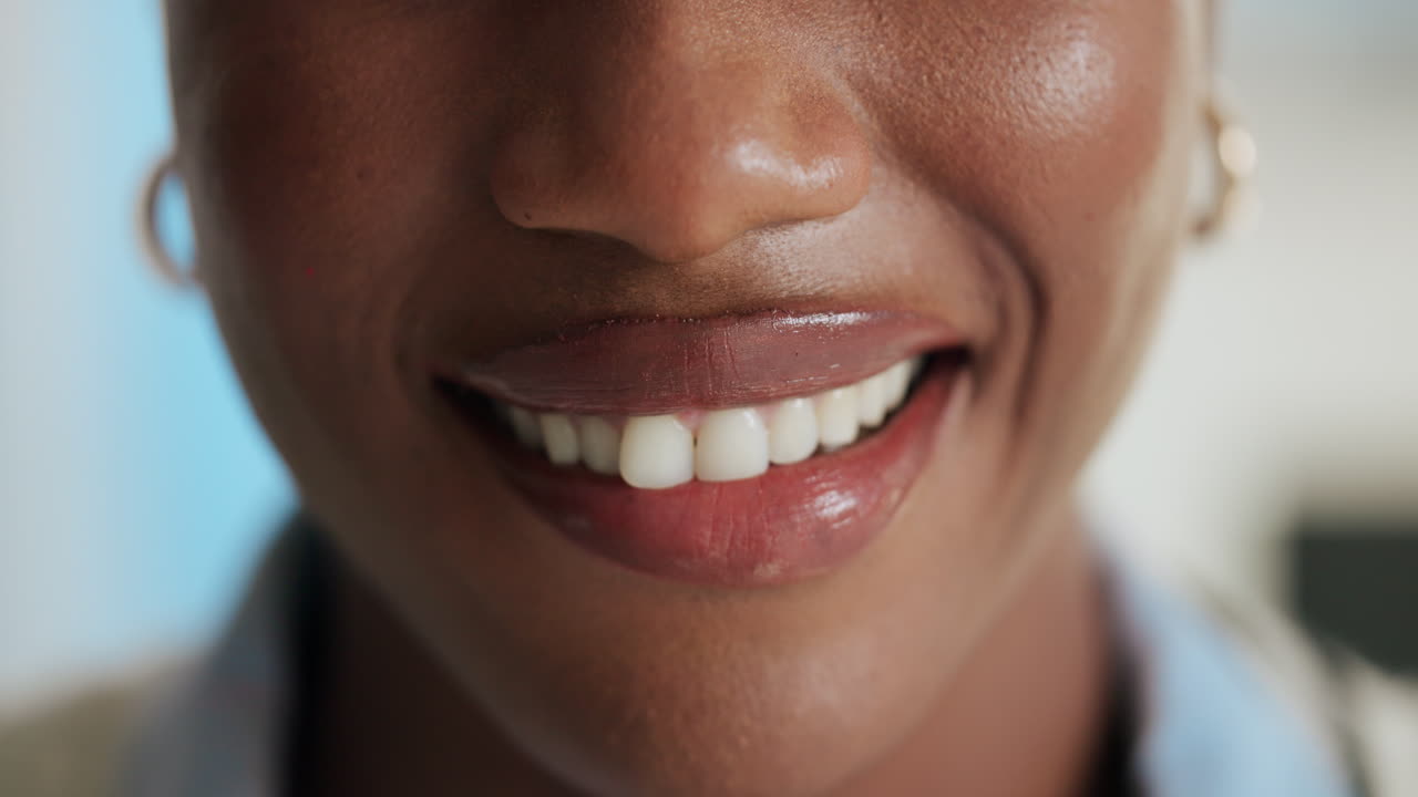 Close-up of a smiling woman's mouth