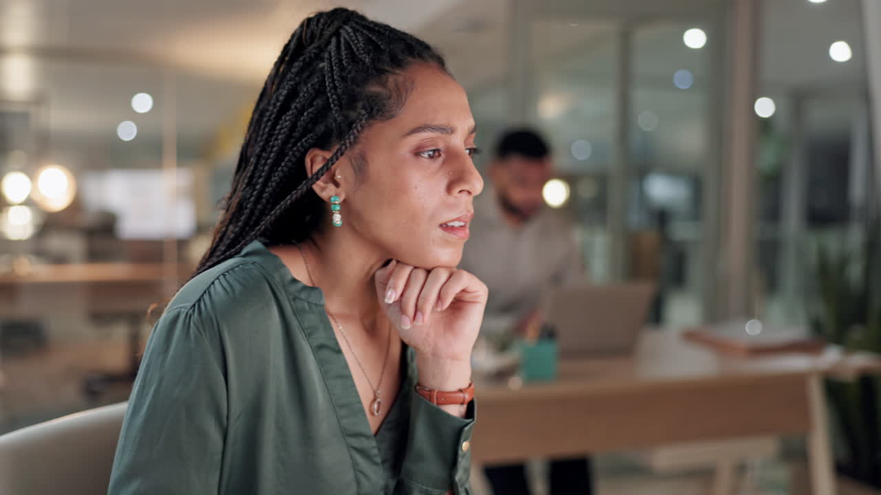 Typing on keyboard, thinking