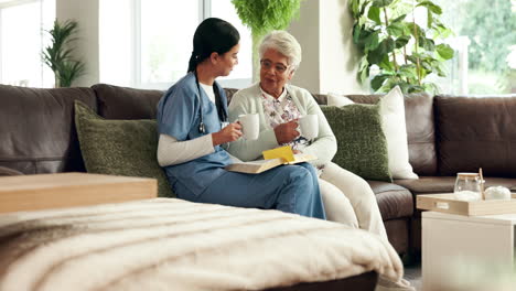 Nurse and Senior Woman Enjoying Coffee and a Book