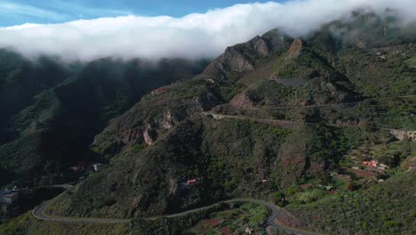 beautiful aerial establishing shot of cloudy anaga mountains in spain