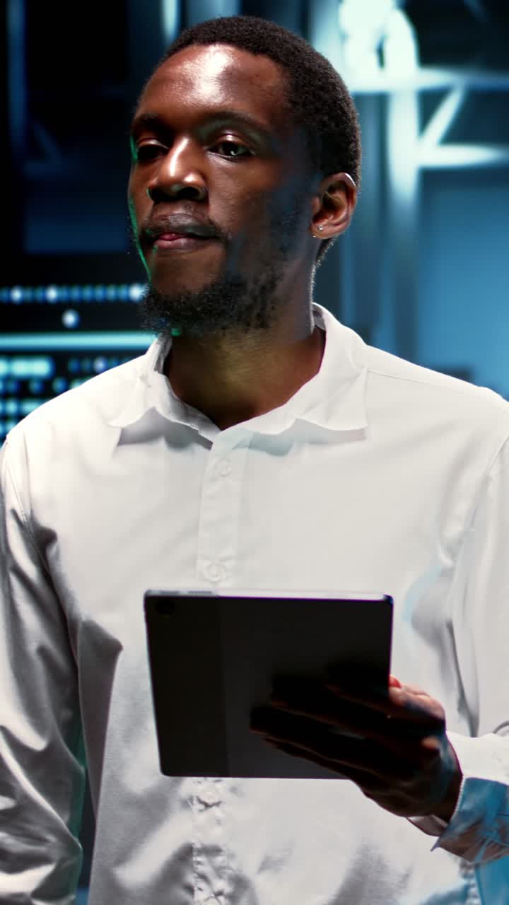 Vertical video Computer scientist in high tech room