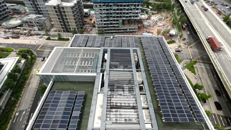 building rooftop with solar panels in singapore - high angle shot