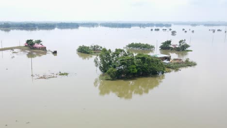 severe flood submerged entire village with houses in bangladesh. aerial view with vertigo effect