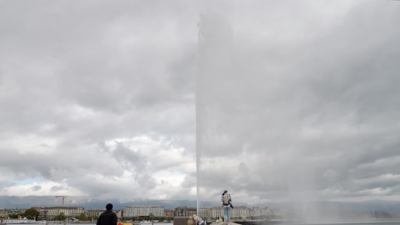 Jet d'Eau in Geneva, Switzerland on a Cloudy Day