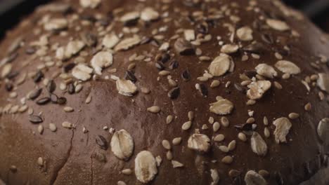 close-up of a freshly baked seeded loaf of bread