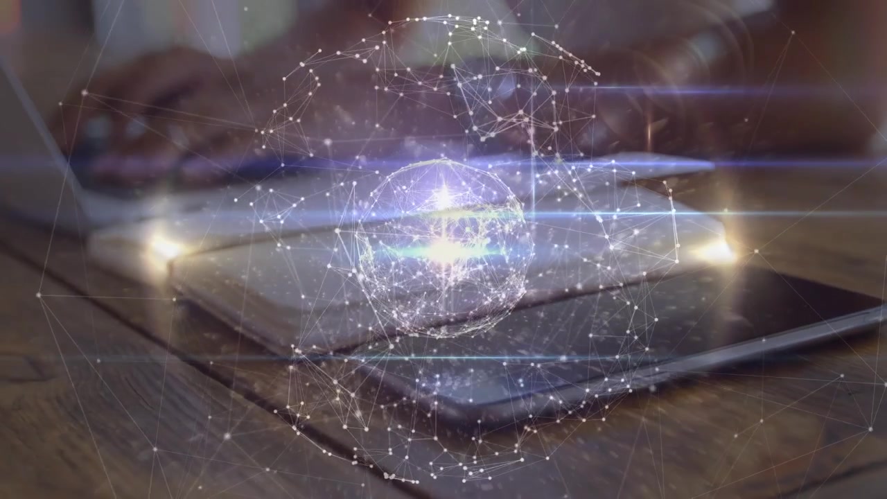 Globe of network of connections spinning over mid section of a woman using a laptop